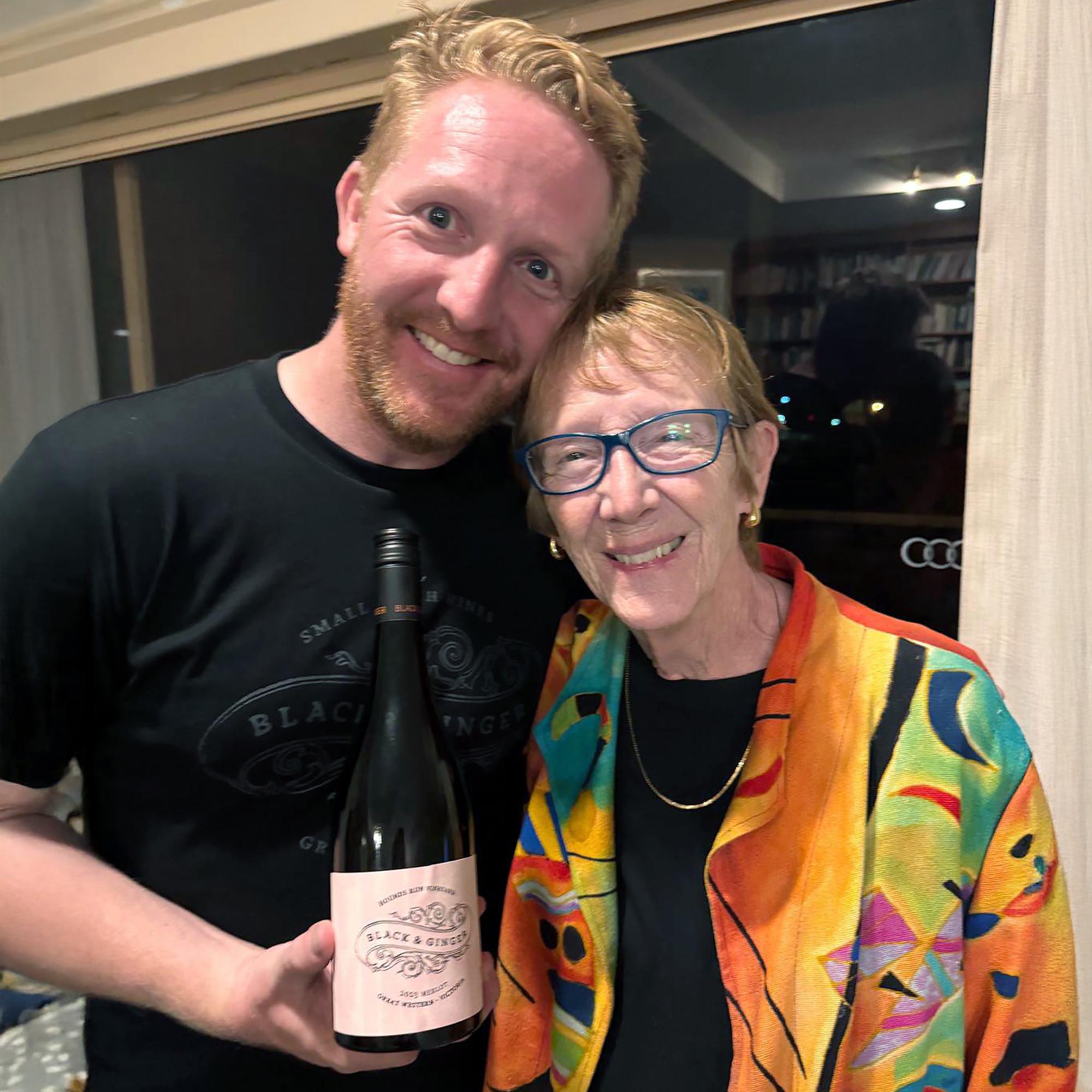 Darcy with his mum Virginia and a bottle of the Virginia Merlot