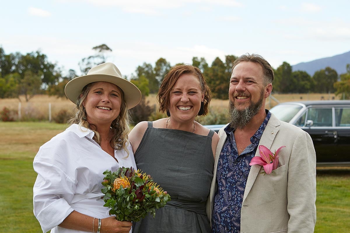Lucy and Hadyn on their wedding day with Eddie, Hadyn's Sister