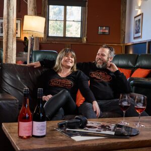 Lucy & Hadyn on a couch at the wine shed